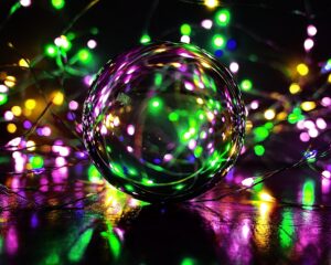 a glass ball with colorful lights around it